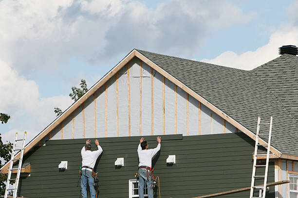 Professional Emergency Siding Repair technician working in Port Washington, NY